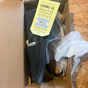 Brand new with tags glitter black kids size 3 toms.